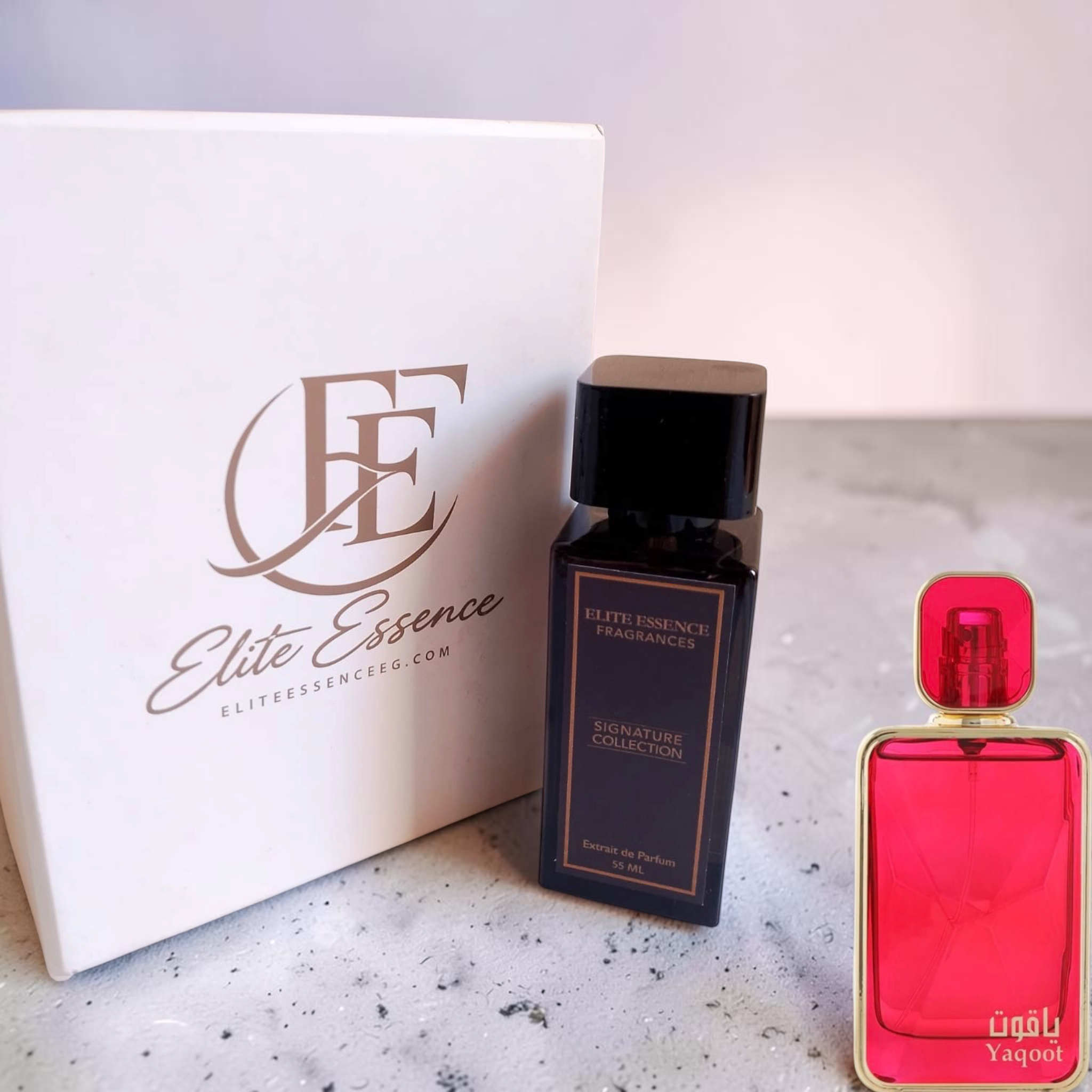 Arabian Oud Yaqoot perfume bottle by Elite Essence, with red-colored fragrance liquid and elegant packaging.