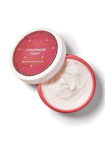 eliteessence Bath & Body Works Champagne Toast whipped body butter in a pink quilted jar with creamy moisturizer inside