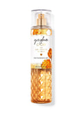 eliteessence Bath & Body Works Gingham Glow fine fragrance mist in a textured gold bottle with floral label design