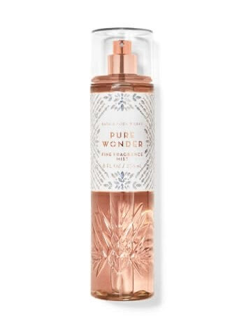 eliteessence Pure Wonder fine fragrance mist in a textured glass bottle with a rose-gold cap and elegant label