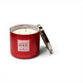 eliteessence You're The One three-wick scented candle in a red glass jar with a sunburst design and silver lid.